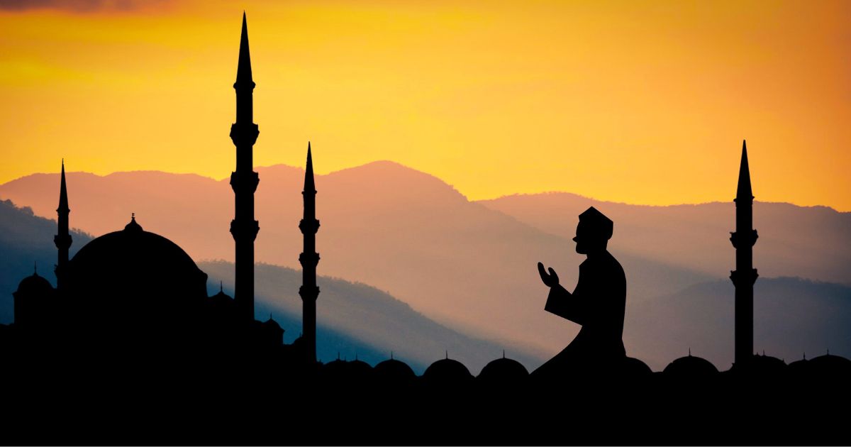 Gambar grafis menggambarkan seorang pria Muslim sedang beribadah menghadap masjid