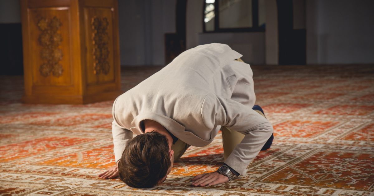 A Muslim man doing prostration during Muslim prayer