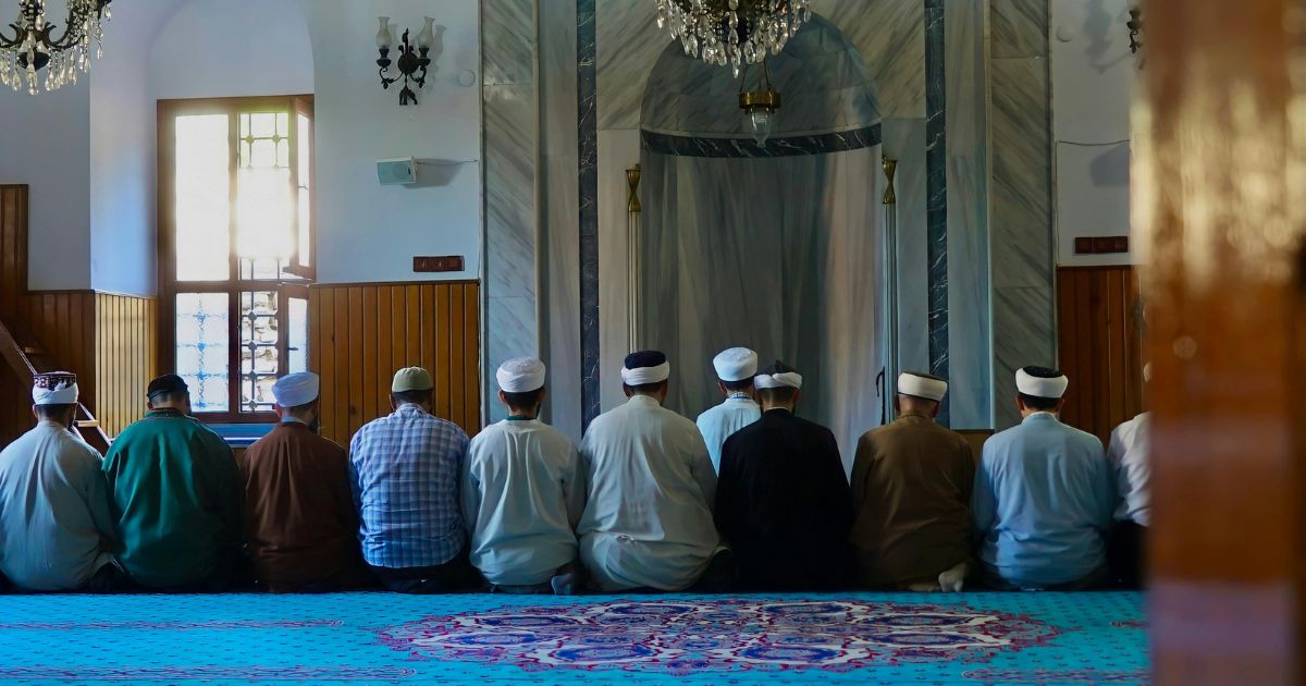 People Kneeling on the Floor Praying