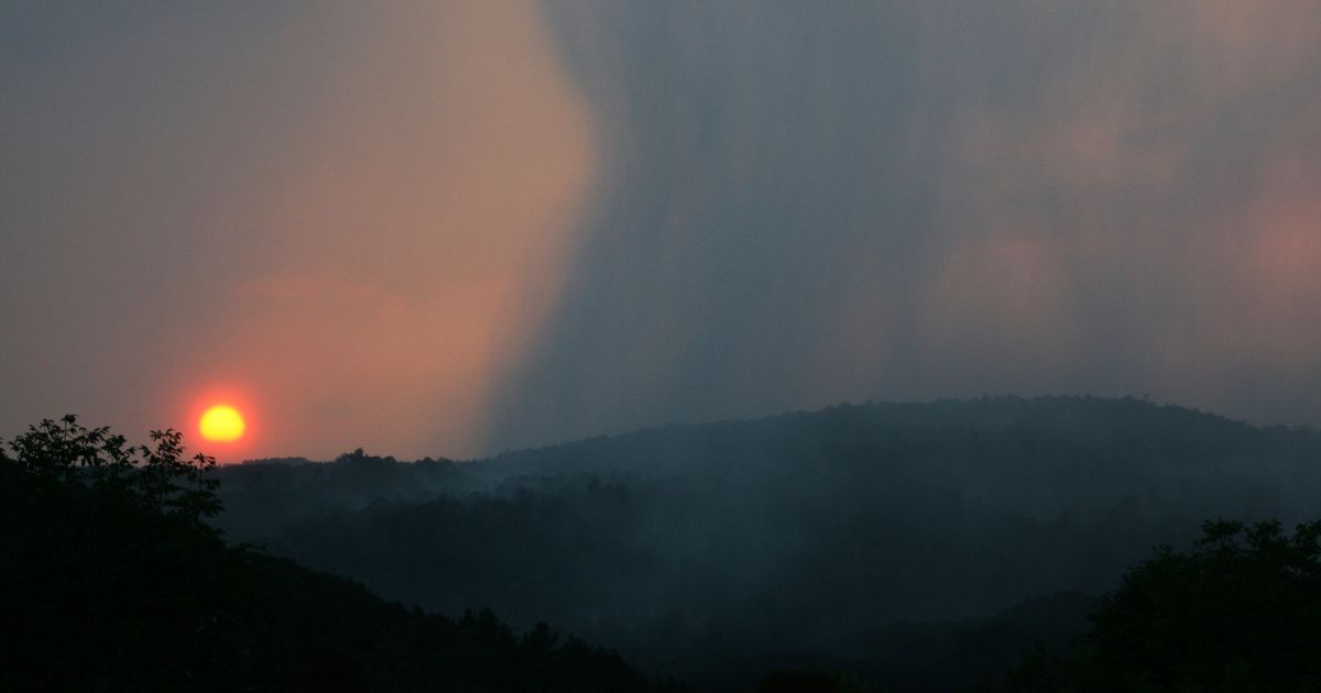 Dimly lit skies when the sun begin to rise over the hill