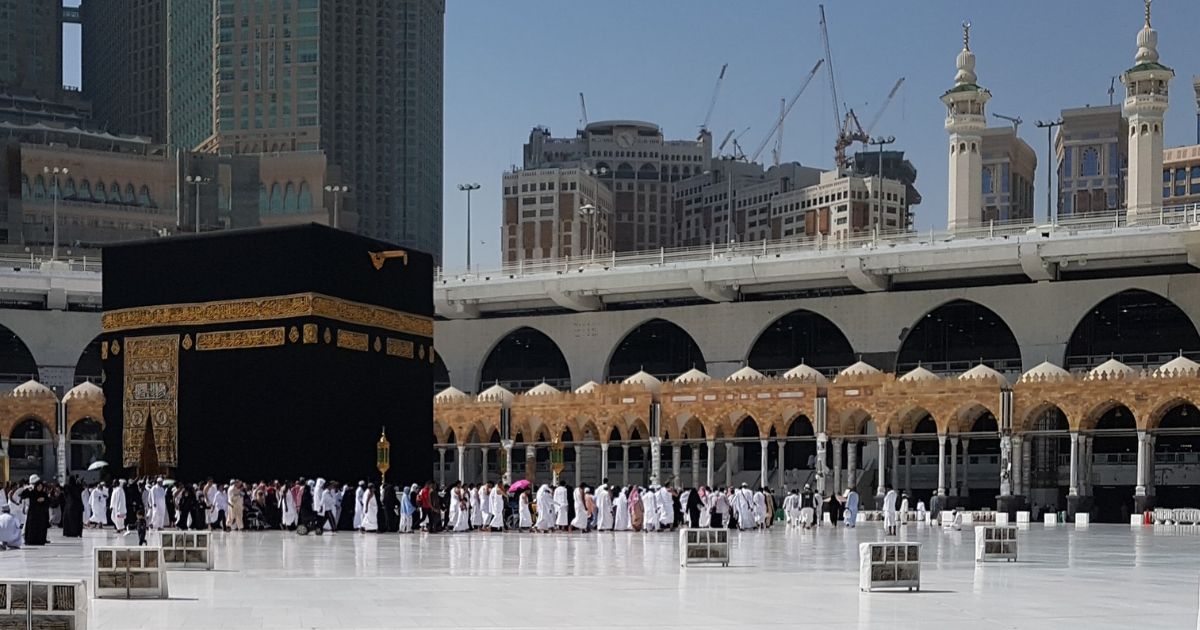 Muslims gather in the courtyard of the Masjid al-Haram around the Kaaba shrine